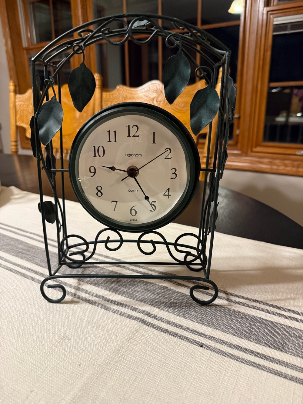 Vintage Ingraham  free—standing Ivy green metal clock, keeps time